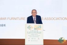 Kyaw Kyaw Win speaking at a podium at the Global Legal and Sustainable Timber Forum 2026