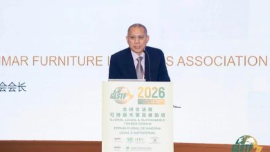 Kyaw Kyaw Win speaking at a podium at the Global Legal and Sustainable Timber Forum 2026